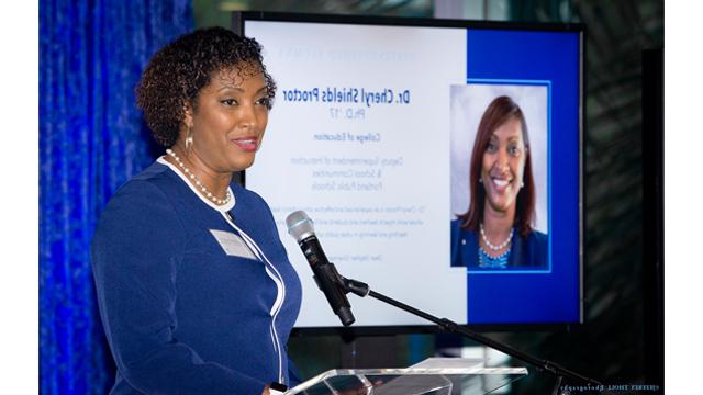 Cheryl Shields Proctor, Ph.D. '17, FAU College of Education, accepting the FAU 2022 FAU Distinguished Alum.