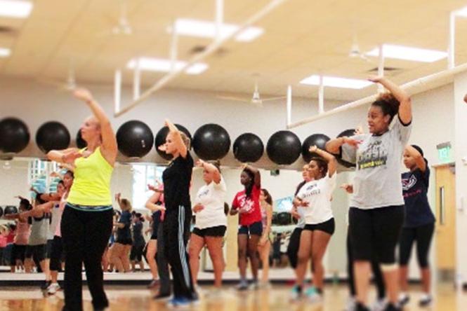 a group of people at a fitness class