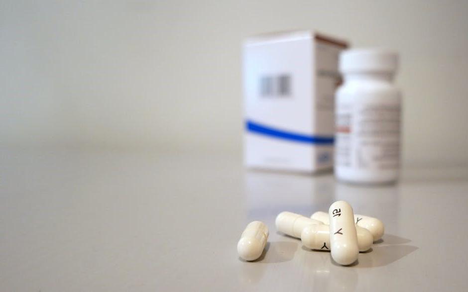 a close-up of white pills on a table