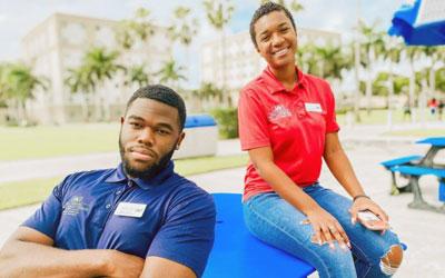 Two Students sitting on the patio