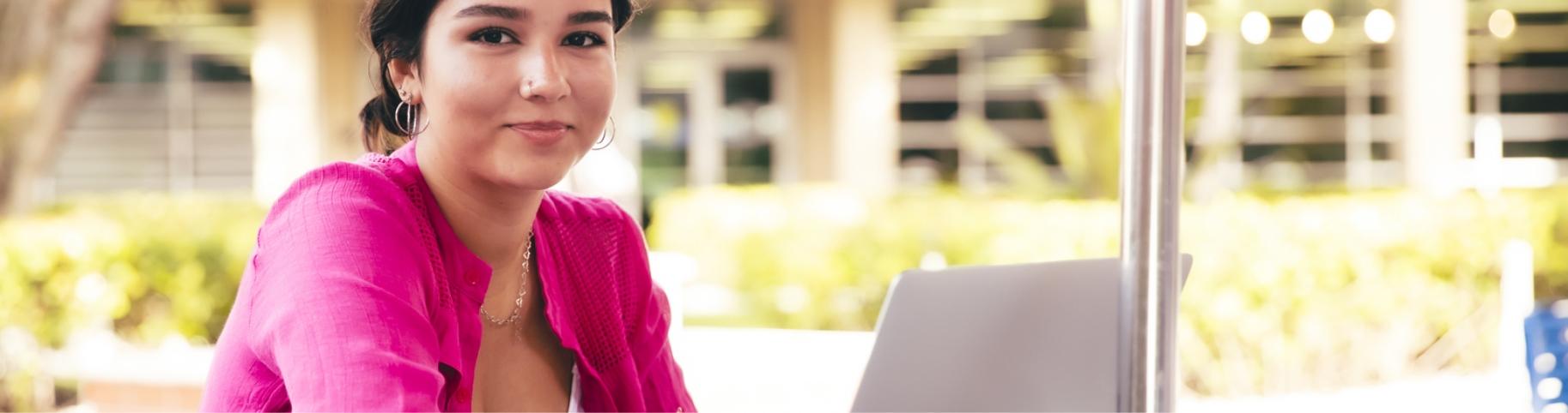 Linkedin Learning Hero Image of a female looking with a blurred background