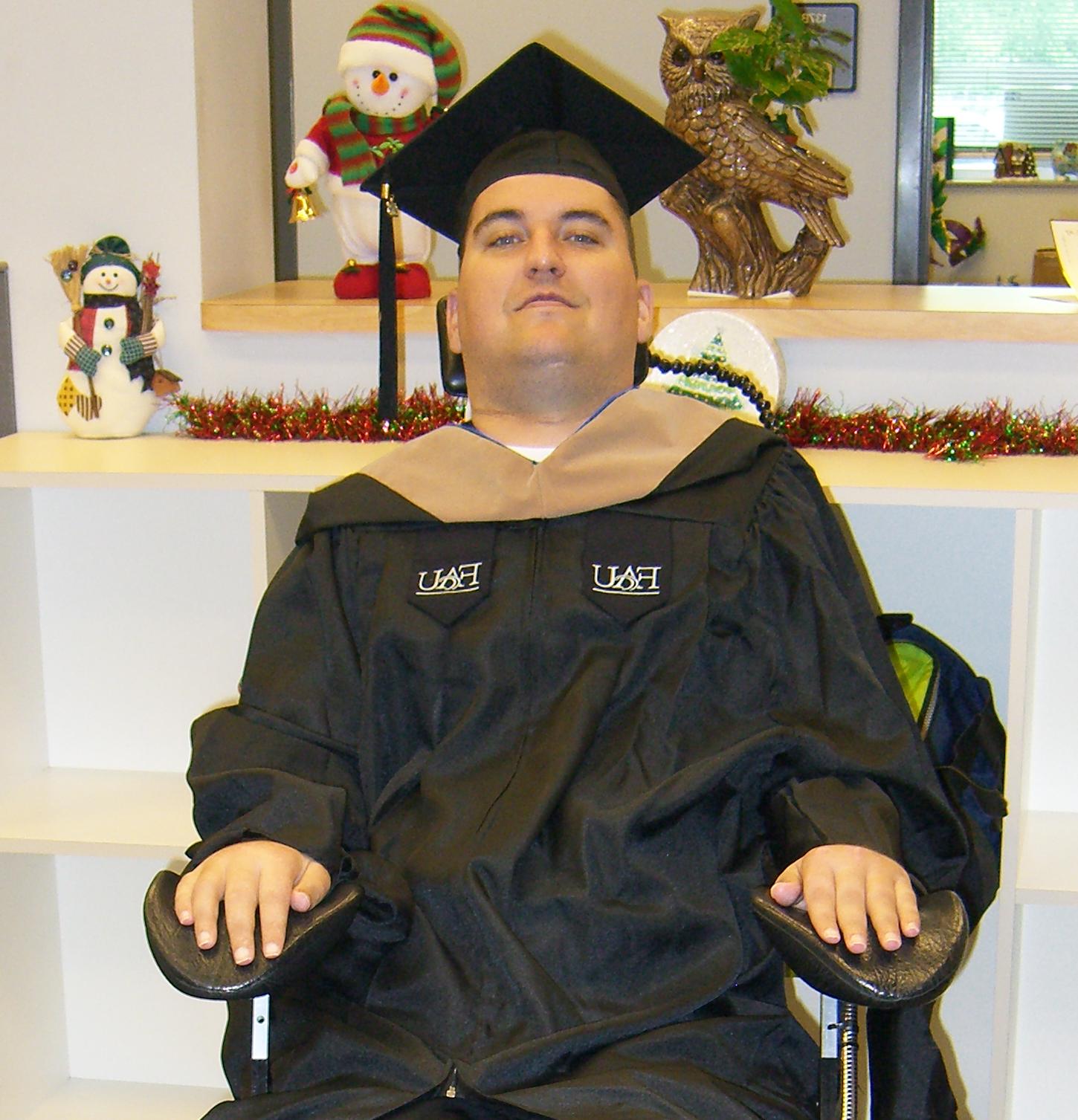 Ryan in graduation gown